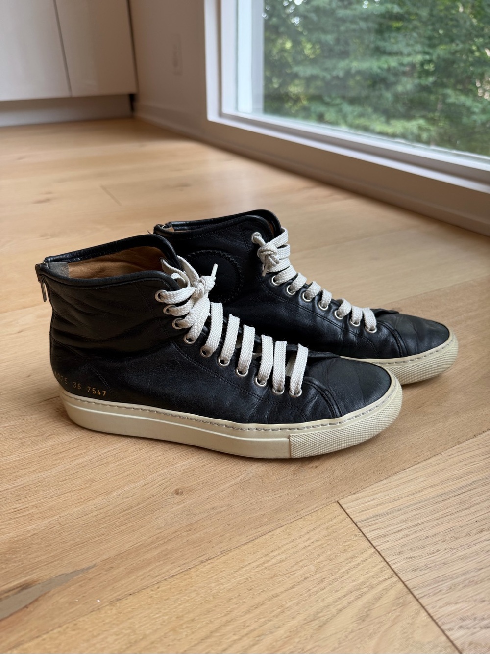 Women by Common Projects - Black High-Top Leather Sneakers